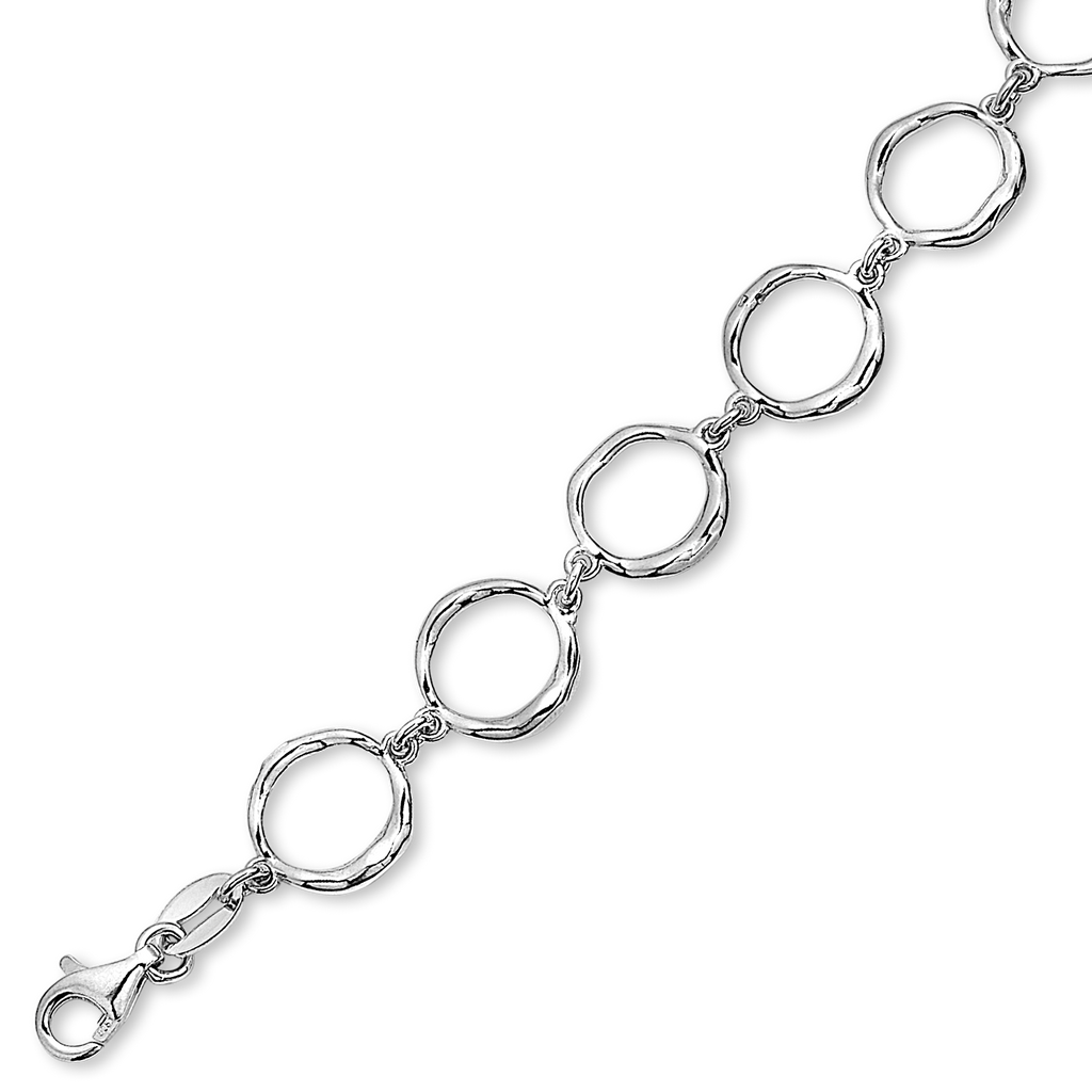 Sølv armbånd rhodium cirkler på række.  Længde 17+4 cm.